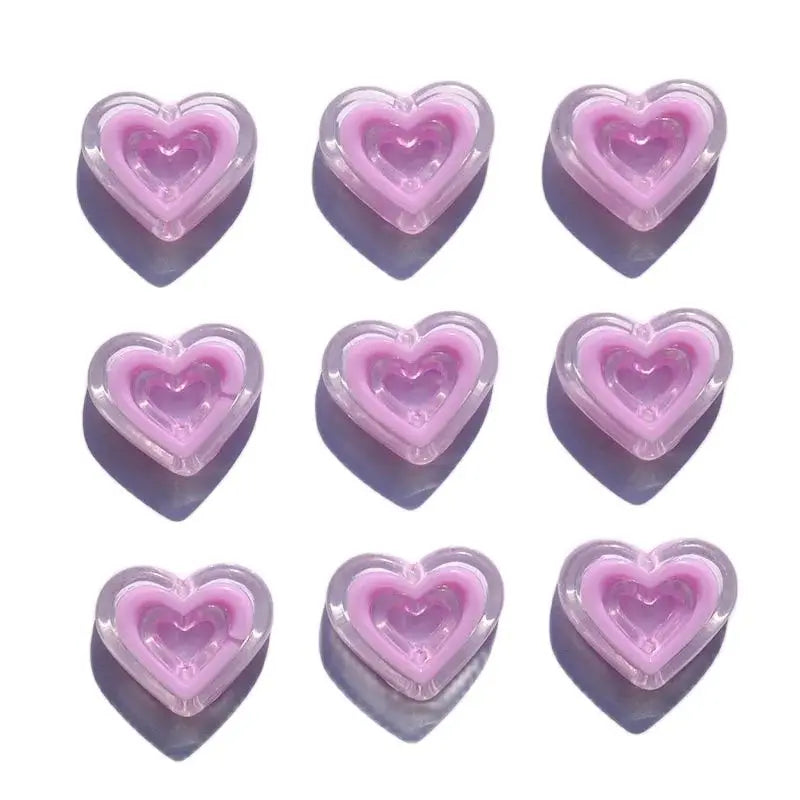 A set of multi-color heart shape acrylic charms displayed on a white background.