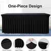 Black one-piece tablecloth featuring elegant pleats and a tight fit on a rectangular table.