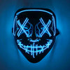 A black mask with glowing blue LED lines forming a skull pattern, mounted on a wall.