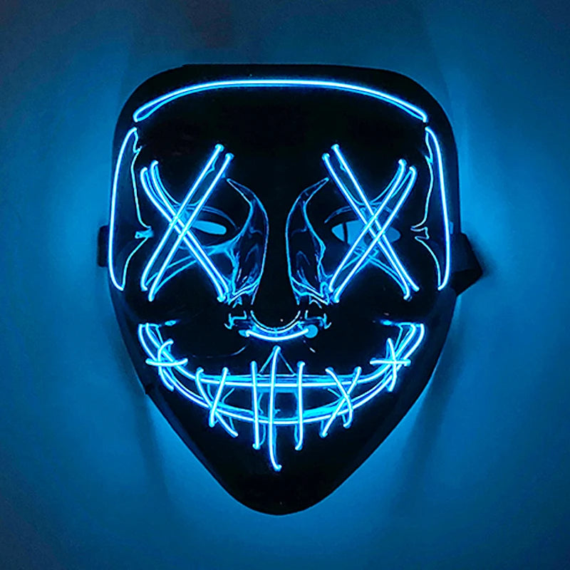 A black mask with glowing blue LED lines forming a skull pattern, mounted on a wall.