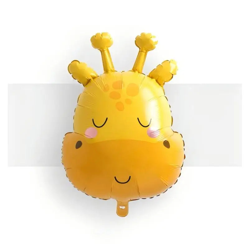 A yellow inflatable giraffe toy with smiling eyes and yellow tufts on its head.