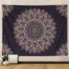 A dark purple bohemian mandala tapestry wall hanging featuring intricate pink and blue geometric patterns.