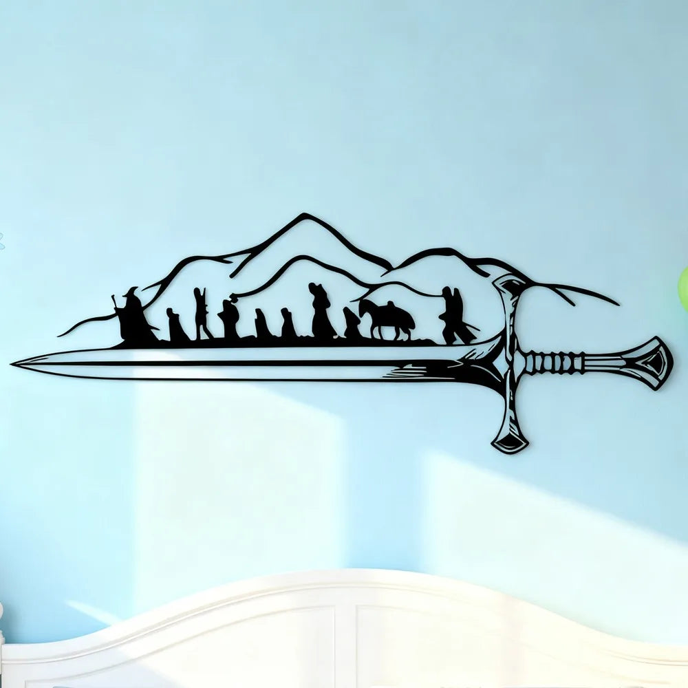 Black silhouette wall art depicting a mountain landscape with figures and a sword.