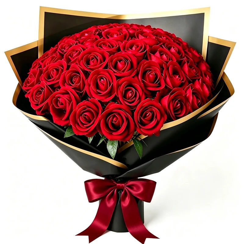 A bouquet of 50 deep red velvet artificial roses wrapped in black paper and tied with a satin ribbon.