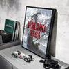 A framed poster of the Vinland Saga anime featuring a warrior on a snowy mountain, displayed on a shelf.