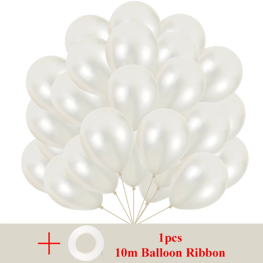 A bunch of ten white pearl latex balloons tied with ribbon for party decor