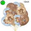 A bunch of 15 gold and light blue balloons featuring cute teddy bear designs for a birthday party banner.
