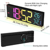 A black digital wall clock displaying time, date, and temperature with a dynamic RGB color changing display.