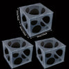 A clear plastic box with a grid pattern and various sized holes for balloon sizing, shown from above and the side.