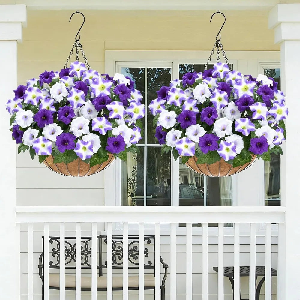 A hanging basket filled with purple and white artificial petunia flowers decorating a porch.