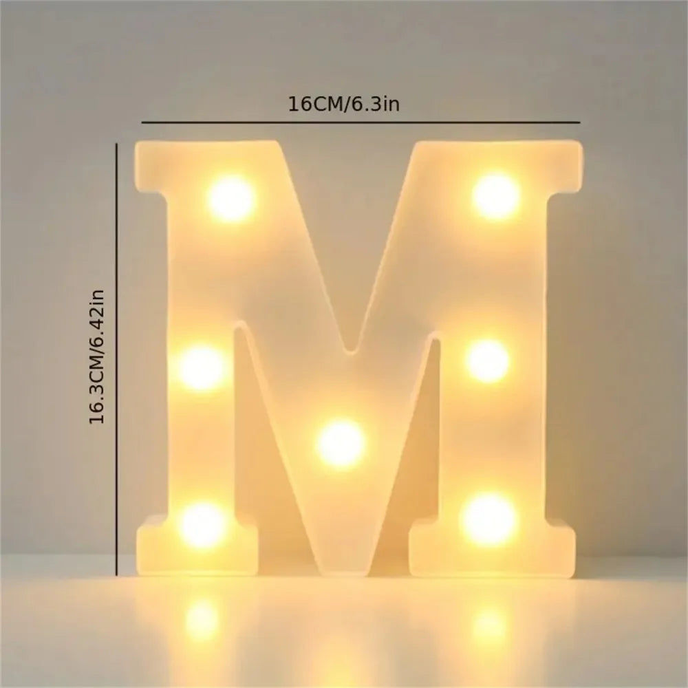 A glowing letter M made of LED lights, used for cozy room or party decor.