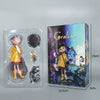 A packaged desktop figurine of Caroline Black Cat featuring a doll in yellow attire and accessories.
