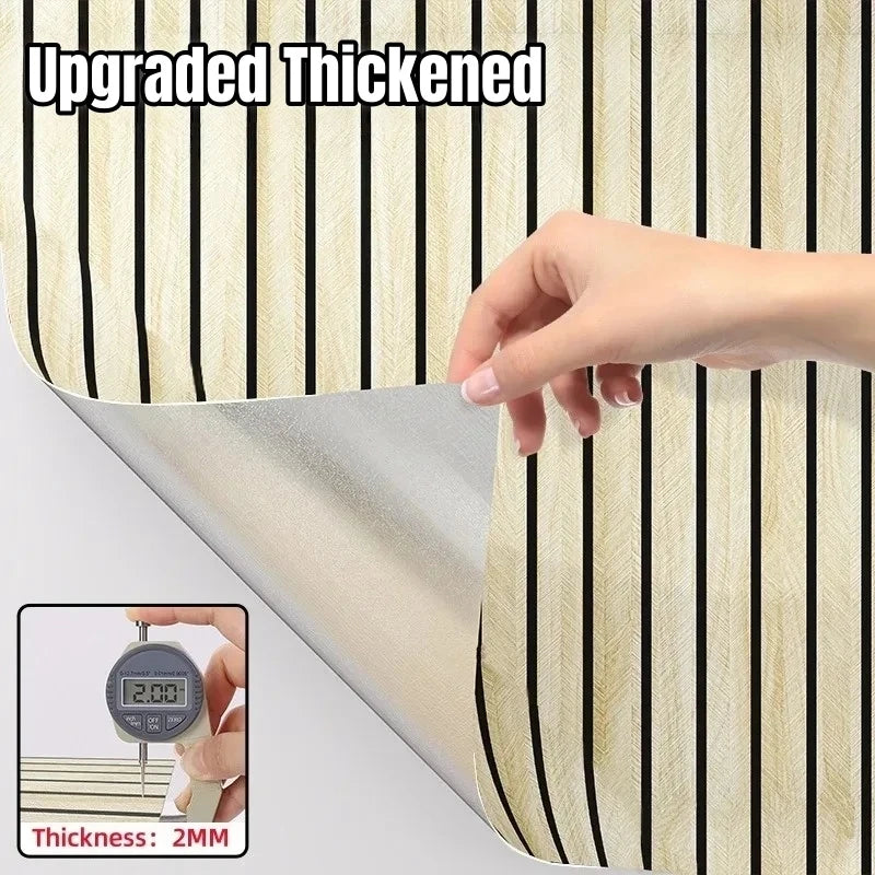 A hand is holding a roll of upgraded thickened wood grain wallpaper, showing the thickness measurement.