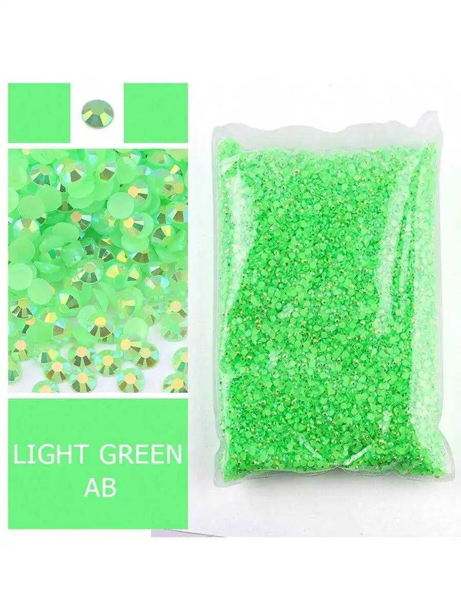 Bag of light green acrylic rhinestones used for craft projects