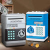 A silver and blue interactive roll-up piggy bank with a keypad and coin slot is shown next to a stack of money.