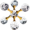 A gold molecular sculpture desk decor featuring spheres of clear and silver glass.