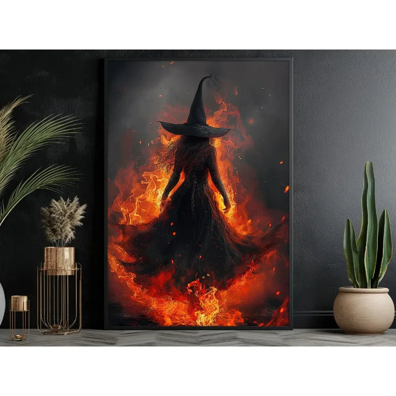 Dark witch figure in a pointed hat emerging from fiery orange and red flames on a canvas print.