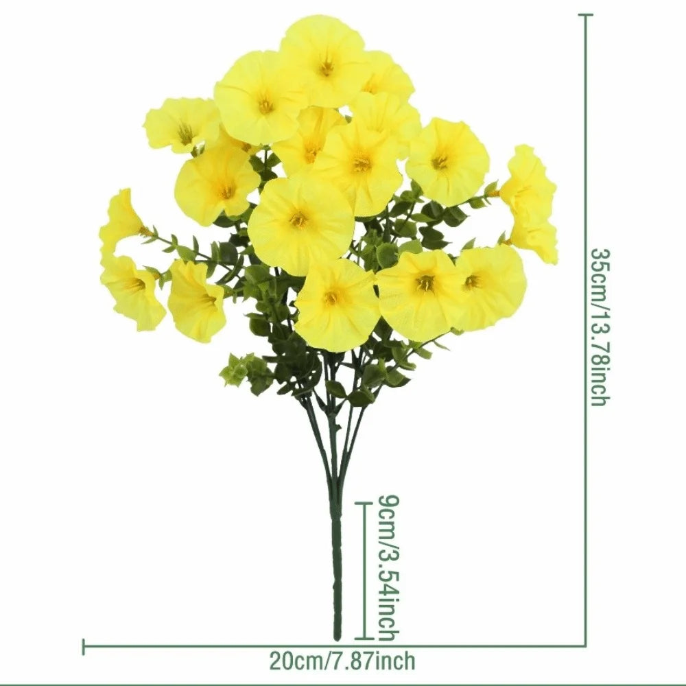 A bouquet of yellow artificial pansy flowers with green eucalyptus stems.