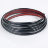 Black and red self-adhesive PVC wall trim tape rolled into a coil.