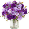 A vibrant bouquet of artificial silk roses and daisies in shades of purple and lavender.