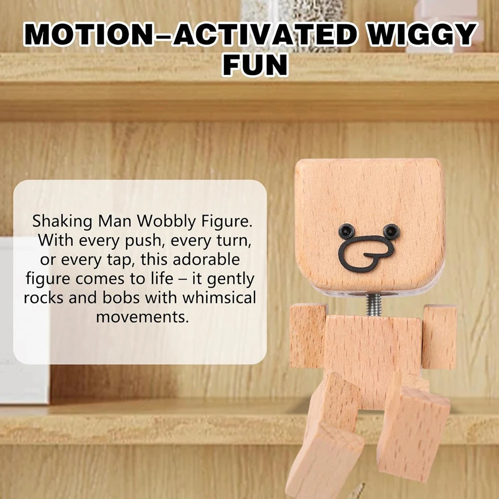 A wooden shaking figure with magnetic expressions is shown on a shelf.