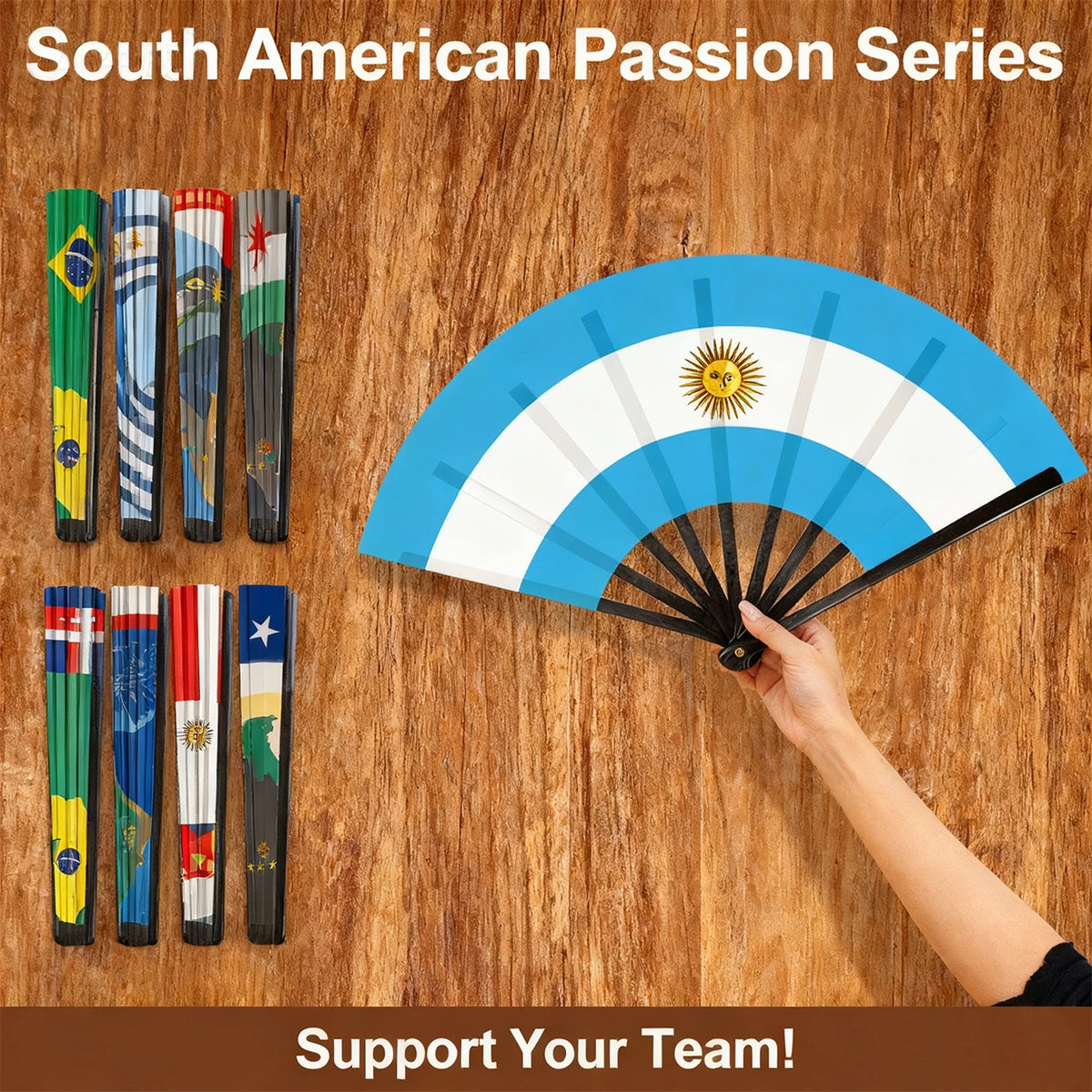 A hand holds an open South American passion series folding cheering fan featuring various national flags.