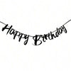A black banner spelling out Happy Birthday with elegant script.