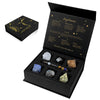 A black gift box containing a natural stone zodiac bracelet and crystal quartz stones for Sagittarius.