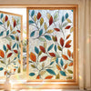 Decorative privacy window film featuring colorful leaves and branches in a wooden frame.