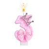 Pink bow crown number birthday candles set with a lit flame