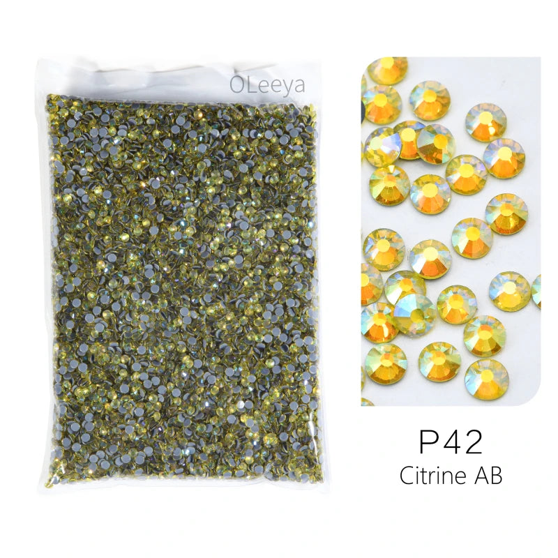 Bag of P42 Citrine AB glass rhinestones with mixed sizes and crystal accents