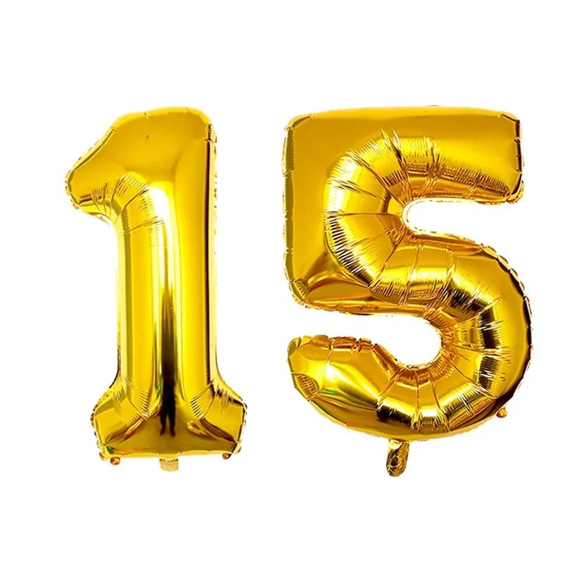 Gold foil number balloons spelling out fifteen