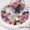A clear glass bowl filled with colorful round spacer beads for jewelry making
