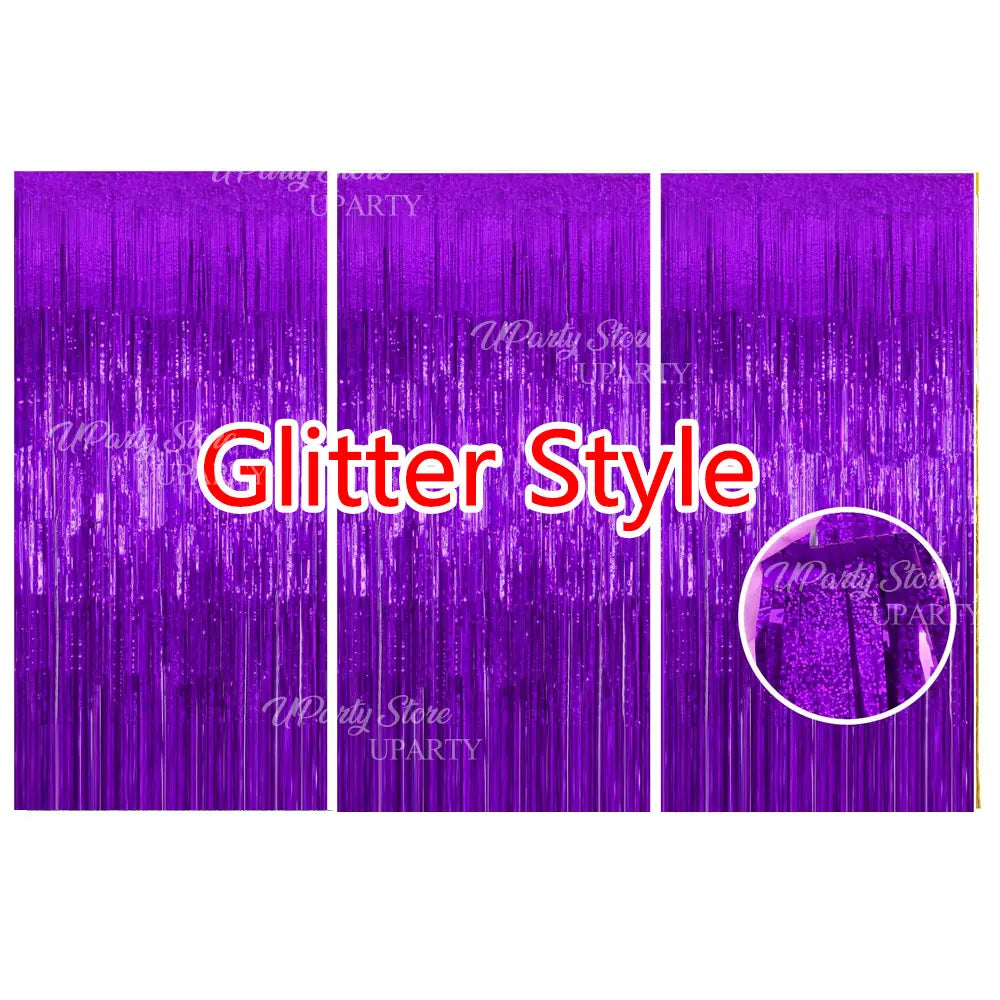 Purple glitter style metallic foil fringe curtains used as a party backdrop decor