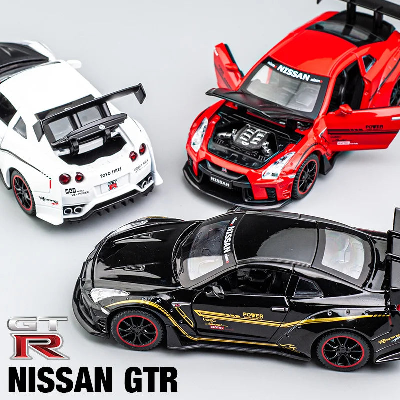 A collection of Nissan GTR diecast models in white, red, and black, showcasing various sports car scales.