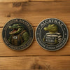A round collectible coin featuring an alligator wearing a life vest, labeled Alligator Alcatraz.