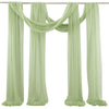 Elegant sage green chiffon arch drapes used as a backdrop for weddings and events