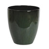 A dark green, glossy resin Monstera plant pot with a saucer.