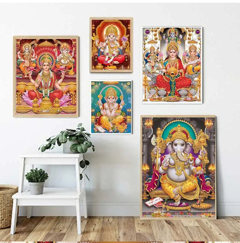A set of three canvas art prints featuring deities including Ganesha, Shiva, and Parvati in vibrant colors.