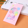 Pink card with purple and green balloons and the text Best Wishes for elegant spiral cake candles