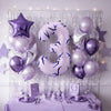Purple and silver balloons forming the number 3 decorated with glitter and stars for a party theme