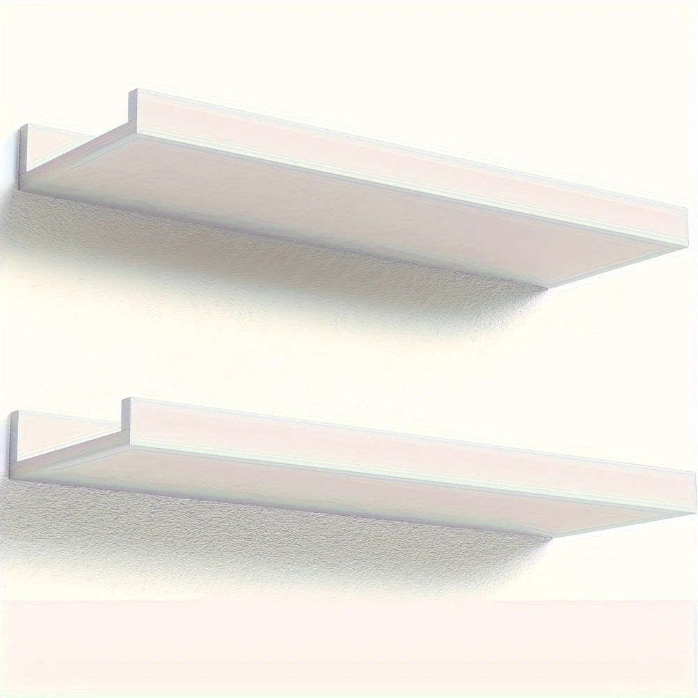 A set of two white rustic floating wood shelves mounted on a wall.