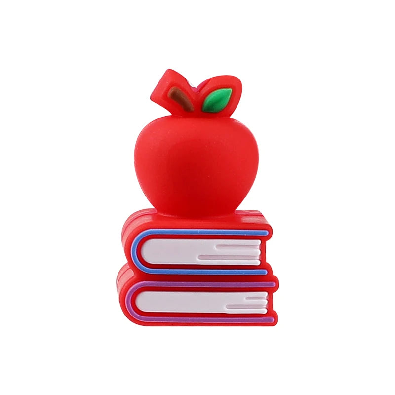 A red 3D silicone apple bead with a green leaf detail.