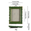 A rectangular vintage baroque resin picture frame with a green frame and light gray mat, shown with dimensions.