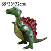 A green dinosaur decoration featuring a textured skin and red scales, used for a birthday party.