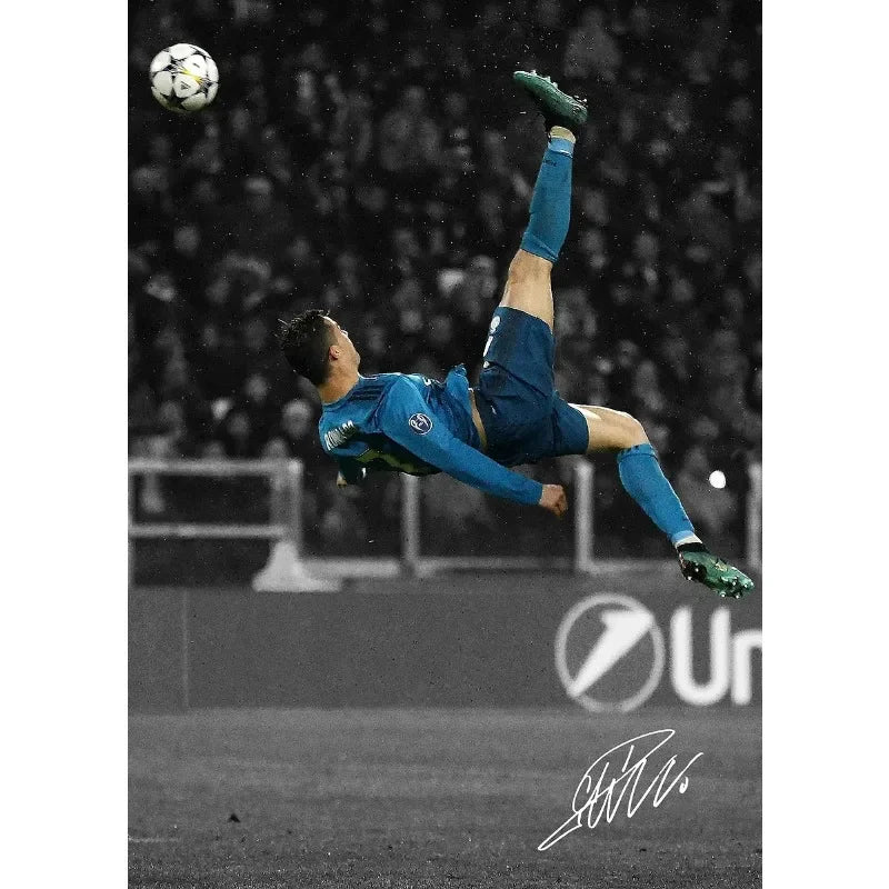 A soccer player in a blue uniform is jumping high to head a ball against a dark, blurred background.