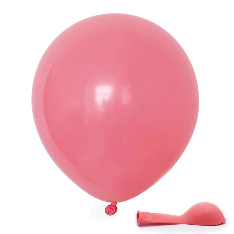 A single pink balloon is shown next to a pink spatula.