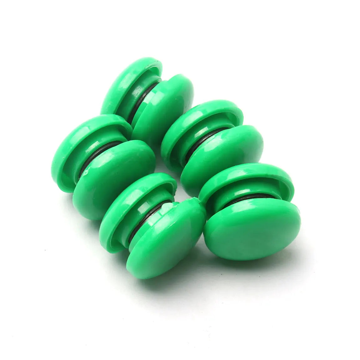 A set of ten bright green refrigerator magnets stacked in a row.