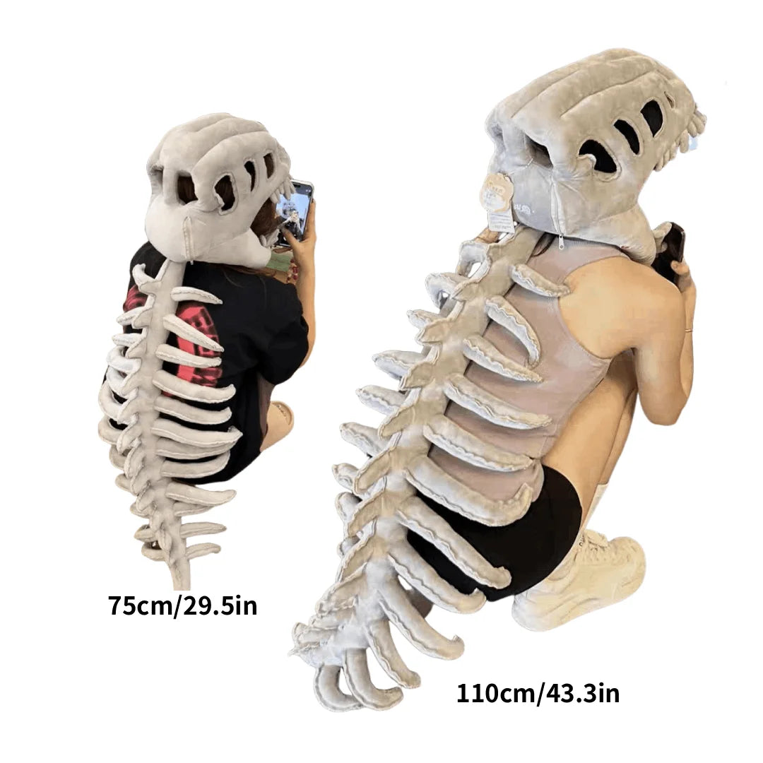 A wearable dinosaur skeleton costume featuring a head and spine, displayed next to a measurement scale.