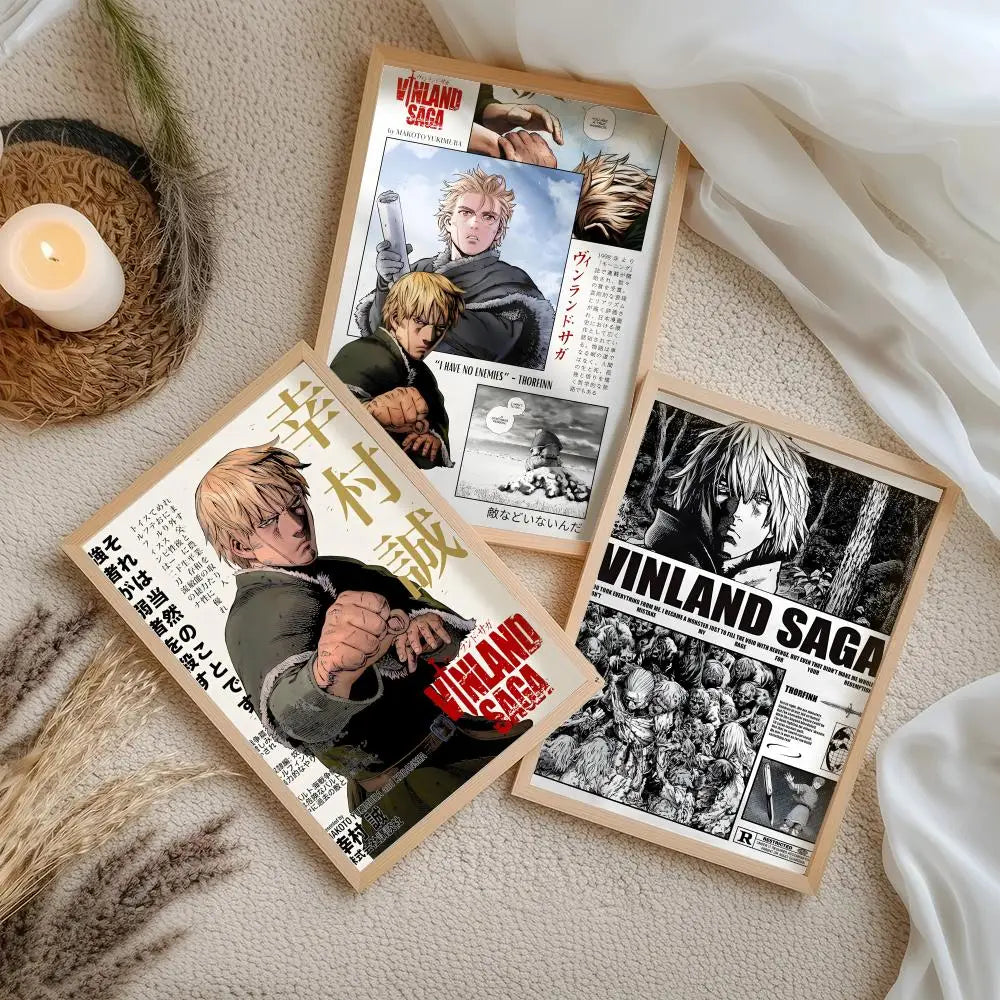 A set of three posters featuring characters from Vinland Saga anime, displayed on a light beige surface.